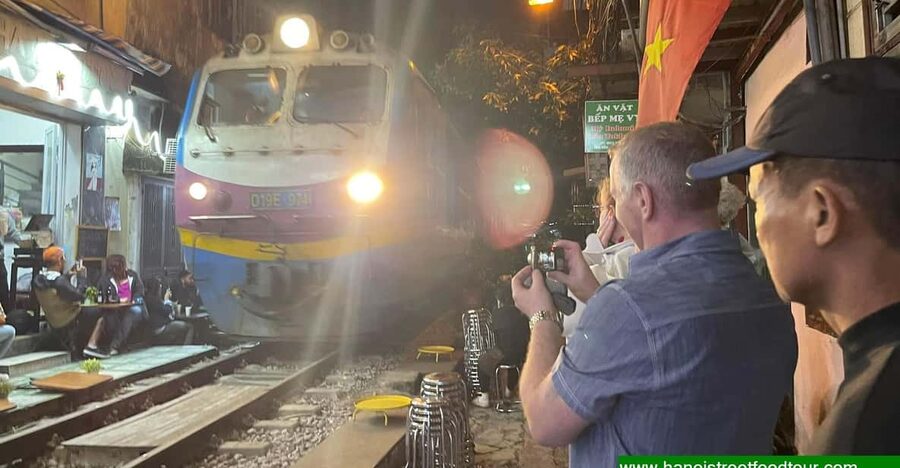 Hanoi Train Street +Best Street Food eating in old quarter - Train Street works best when the timing falls right
