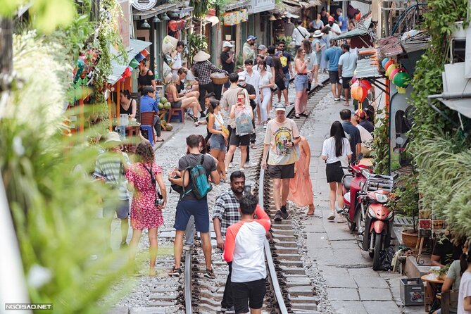 Hanoi Vespa After Dark Street food + Train Street+ Live Music - Long Bien Bridge and the Red River after dark