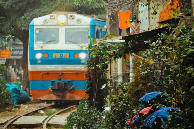 Hanoi Walking Street Food Tour with Train-Street Visit - Meeting at 38 Bat Su Street in the Old Quarter
