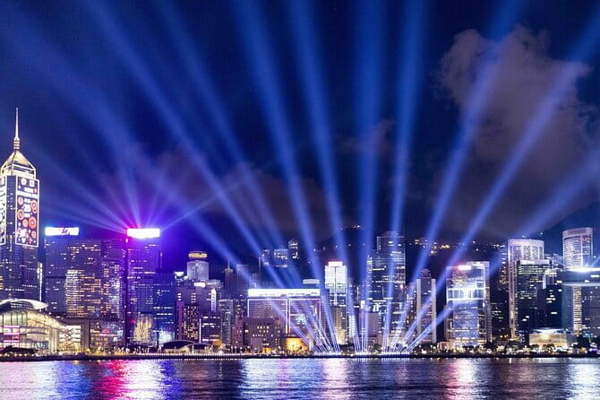 HK Night Views: Victoria Peak Tram & Cruise Buffet Tour - Golden Bauhinia Square and the handover symbol