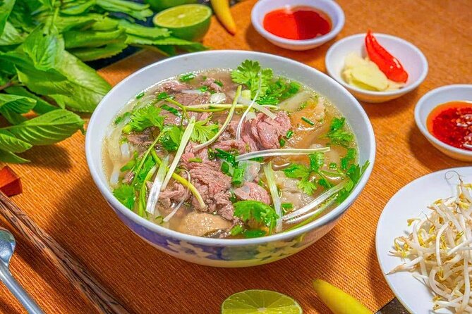 (HOT) Hanoi Guided Street Food and Train Street Tour with Local - Meeting point, timing, and practical details