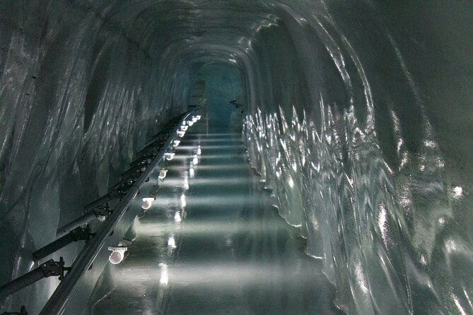 Jungfraujoch & Lauterbrunnen Alpine Tour | From Bern - Riding the historic railway toward Jungfraujoch