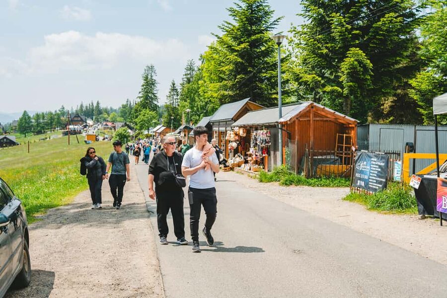 Krakow: Zakopane One Day Trip with Funicular & Thermal Pools - Two hours along Krupówki Street