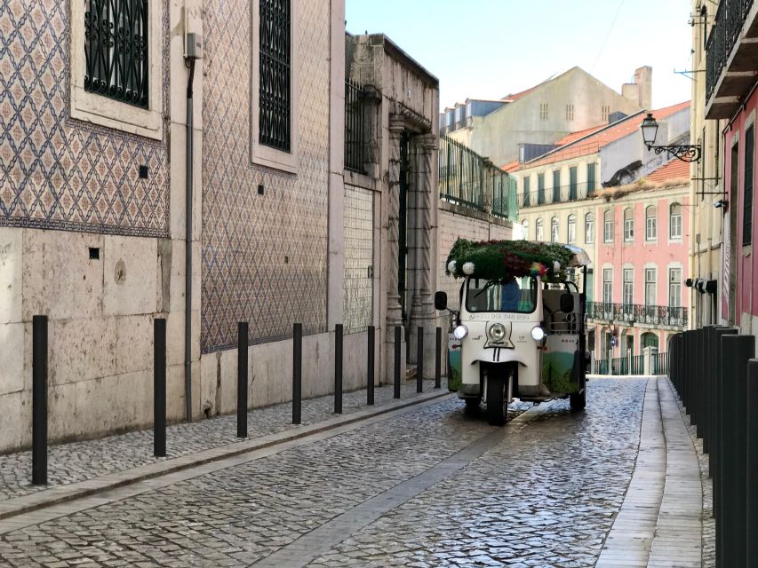 Lisbon: Famous 28 Tram Line Guided Private Tour by Tuk-Tuk - Lisbon Cathedral and the first look at Alfama