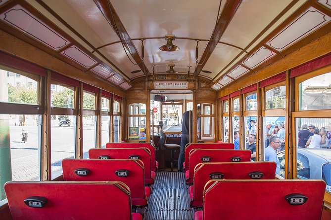 Lisbon Hills Red Tram by Tram 28 route - Viewpoints, squares, and the XII Cent Monument