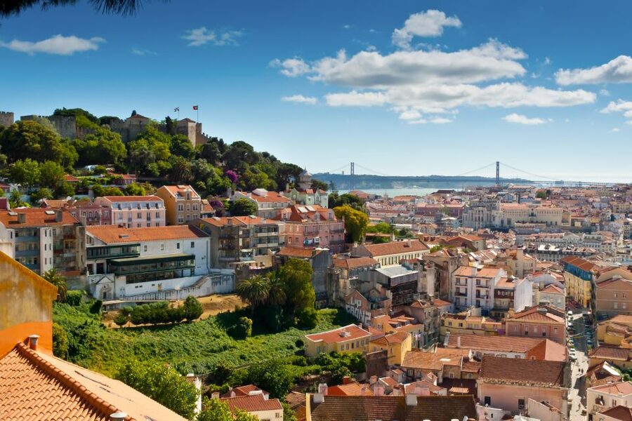 Lisbon: Hills Red Tram Tour by Tram 28 Route 24-Hour Ticket - Alfama brings the steep streets and river views