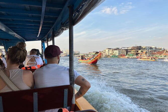 Maeklong Railway and Damnoen Saduak Floating Market Tour - Maeklong Railway Market and the umbrella trick