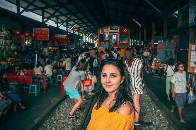 Maeklong Railway & Damnoen Saduak Floating Market Tour – Full Day - A closer look at the sugar palm stop in Amphawa