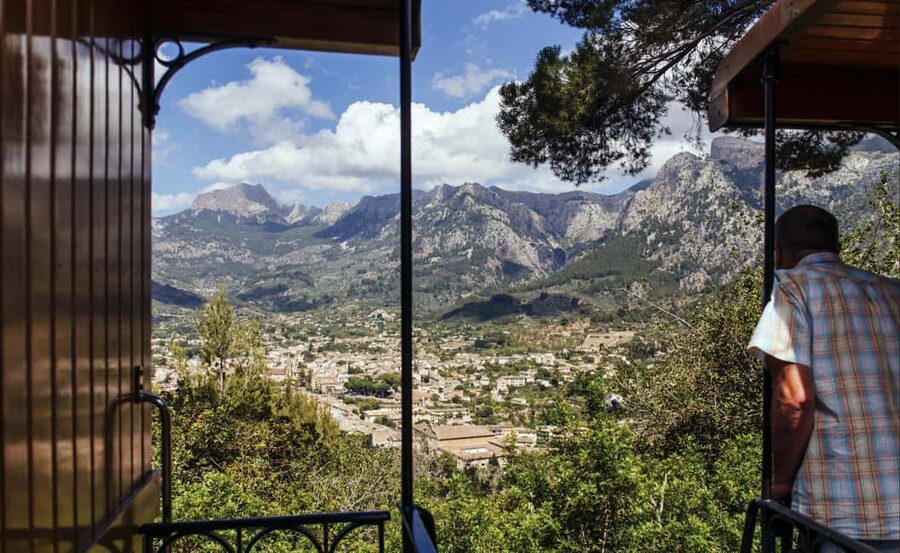 Mallorca: Exclusive Soller Train and Tram Half-Day Tour - Sóller Railway: mountain views, wooden carriages, and tunnels