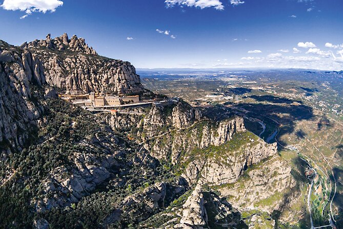 Montserrat Day Trip from Barcelona with Cogwheel Train - Arriving at Montserrat