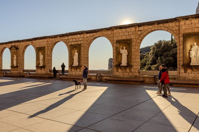 Montserrat Tour with Cogwheel Train, Monastery & Black Madonna - Free time at the abbey and Santa Cueva