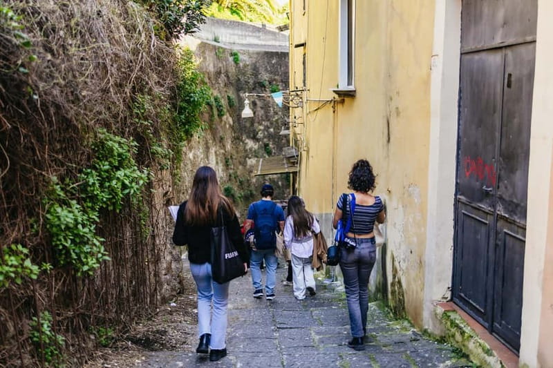 Naples: Panoramic Walking Tour with Funicular - The Spanish Quarters are the noisy payoff