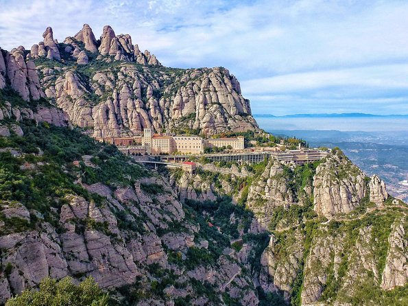 Panoramic Barcelona and Montserrat with Cog-Wheel Train - Passeig de Gràcia and Gaudí from the bus