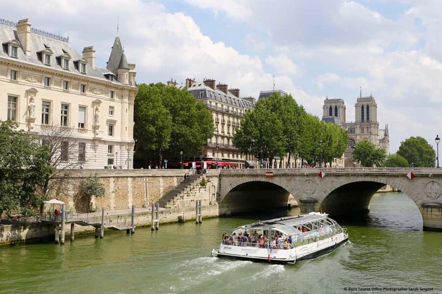 Paris: Montmartre Train Ride w/ Optional Seine River Cruise - Sacré-Cœur and Saint-Pierre Church at the starting point