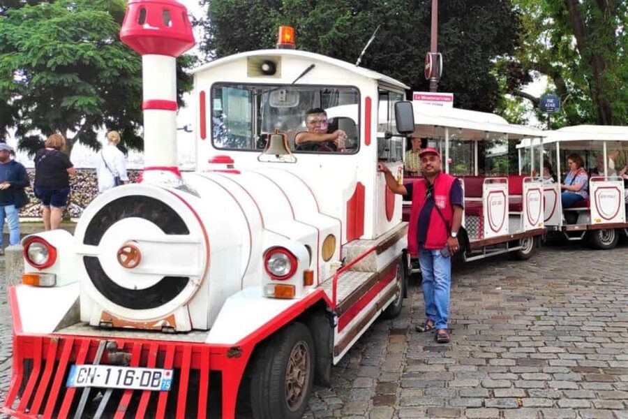 Paris: Montmartre Train Ride w/ Optional Seine River Cruise - Moulin Rouge, Lapin Agile, and Montmartre Cemetery