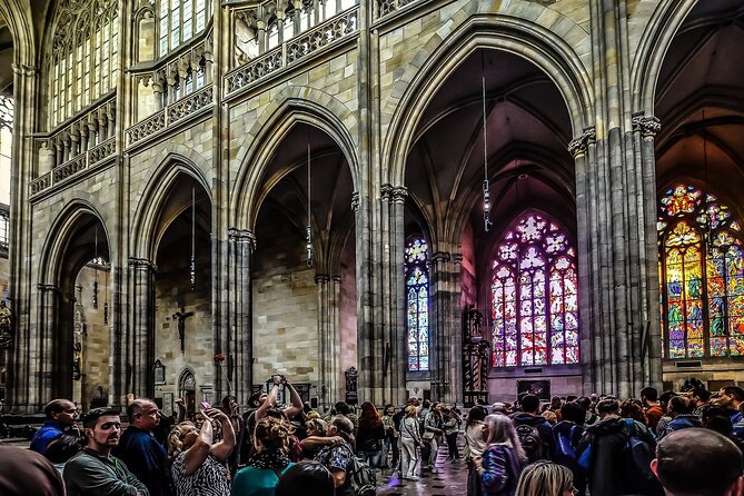 Prague DeLuxe Tour: Views, Hidden Gems, Tastings & River Cruise - Crossing into Lesser Town and visiting Infant Jesus