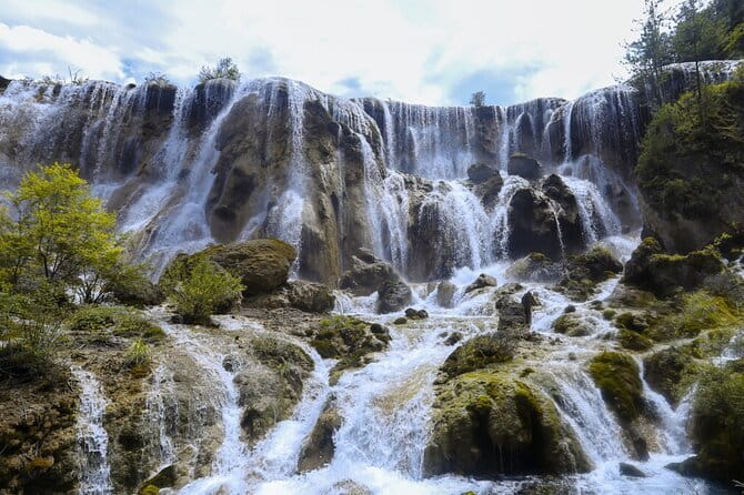 Private 2-Day Jiuzhaigou & Huanglong Tour by Train from Chengdu - Huanglong in five hours: cable car up, boardwalk down