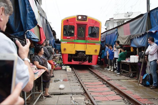Private Excursion to Maeklong Railway and Floating Markets - Tasting Thai sweets, fruit, and market food