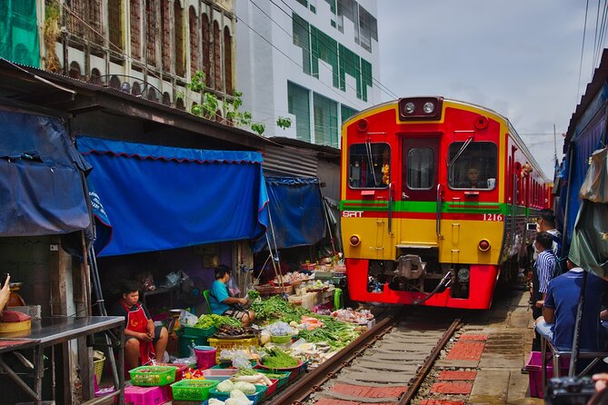 Private Floating Market and Maeklong Railway Market Day Tour - Maeklong Railway Market: Bangkok’s train-through-the-stalls spectacle