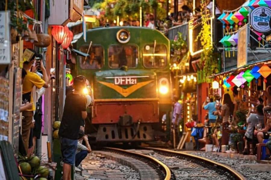 Private: Hanoi Street Food Exploration and Train Street Trip - Market lanes and small local eateries