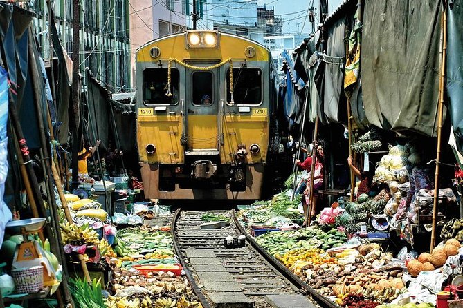 Private Tour: Amphawa Floating Market & Maeklong Railway Market - A banyan-covered Buddha at Wat Bang Kung