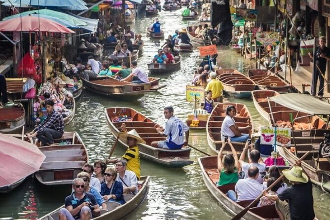 Private Tour to Railway Market and Damnoen Saduak Floating Market - Maeklong Railway Market and the train that cuts through it