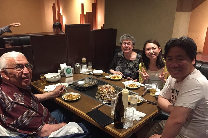 Private tour with Yasushi and Yoko - by car, train, on foot - Tsukiji Jogai Market and a flexible seafood lunch