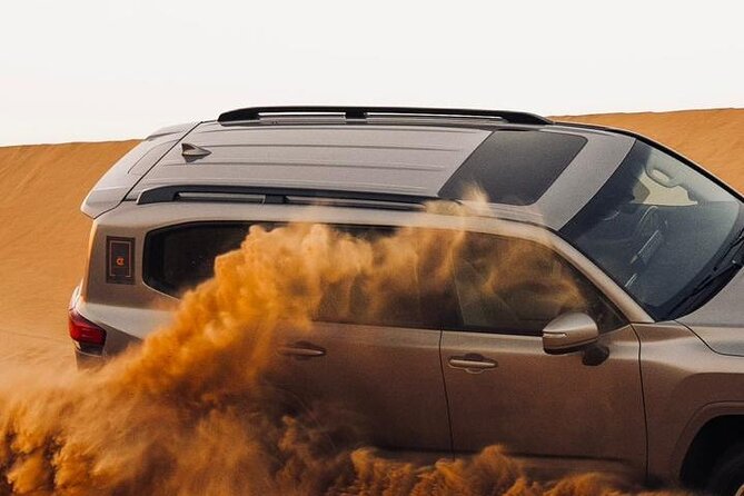 Sand Rail Dune Buggy Adventure with Sandboarding & Camel Riding - The highest dune photo stop