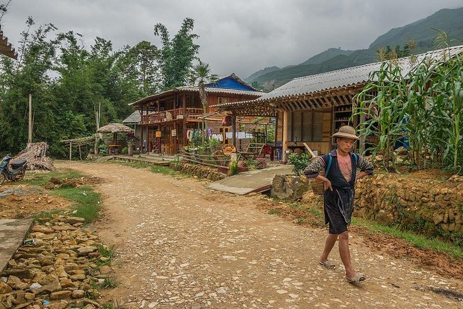Sapa 2 Days 1 night By Bus/Train - Overnight in Hotel 3</em> With Mountain View – Sapa in two days, with the road doing much of the work’ /></p>
<p><p>This is a fast introduction to northern Vietnam’s mountain country. You leave Hanoi early, ride toward Lao Cai, climb toward Sapa, spend one night there, and return the next afternoon.</p>
</p>
<p><p>That schedule works well if you have limited time. You do not need to arrange separate transport, village visits, meals, or a hotel. The tradeoff is clear: much of the first and last day is spent sitting on a bus.</p>
</p>
<p><p>The advertised price of $84.27 is good value for a short organized trip. Your fare includes both long transfers, local transport during the sightseeing, accommodation, four meals, entrance fees, mineral water, and an English-speaking guide. It is less attractive if you prefer a quiet small-group trip or want several days to explore Sapa at a slower pace.</p>
</p>
<p><p>The road schedule includes two comfort breaks on the way to Sapa and two more on the return to Hanoi. The vehicle is air-conditioned and may offer Wi-Fi, cold water, and wet tissues. Since buses can hold from 16 to 45 people, you should expect a group outing rather than a private mountain walk.</p>
</p>
<div class="twil" style="margin: 20px 0; padding: 15px 0;"><p>More Evening Trips in Hanoi:</p><ul style="margin: 10px 0; padding-left: 0; list-style: none;"><li style="margin: 0 0 12px 0; padding: 0 0 12px 0; border-bottom: 1px solid #DEE7F1; line-height: 1.4;"><a href="https://therailtraveler.com/vespa-female-ao-dai-riders-night-street-food-see-train-street/">Vespa Female Ao Dai riders Night Street Food + See Train Street</a><br><span style="font-size: 0.82em; color: #555;"><span style="color: #14559A;">★</span> 5.0 · 254 reviews</span></li><li style="margin: 0 0 12px 0; padding: 0 0 12px 0; border-bottom: 1px solid #DEE7F1; line-height: 1.4;"><a href="https://therailtraveler.com/hanoi-jeep-by-night-street-food-tour-and-train-street-experience/">Hanoi Jeep By Night Street Food Tour and Train Street Experience</a><br><span style="font-size: 0.82em; color: #555;"><span style="color: #14559A;">★</span> 5.0 · 66 reviews</span></li><li style="margin: 0; padding: 0; border-bottom: none; line-height: 1.4;"><a href="https://therailtraveler.com/sapa-3-day-3-night-trek-and-hotel-with-overnight-train/">Sapa: 3-Day, 3-Night Trek and Hotel with Overnight Train</a><br><span style="font-size: 0.82em; color: #555;"><span style="color: #14559A;">★</span> 4.2 · 64 reviews</span></li></ul></div><h2>From Hanoi Opera House to Sapa Town</h2>
<p> With Mountain View – From Hanoi Opera House to Sapa Town’ /></p>
<p><p>Pickup begins between 6:30 and 7:00 a.m. at the Hanoi Opera House meeting point, with hotel or accommodation pickup also offered. The exact pickup arrangement matters, so keep your phone available and be ready early.</p>
</p>
<p><p>The route follows the highway toward Lao Cai City. You stop first around 9:30 a.m., then again near 11:00 a.m. before the final climb to Sapa. Arrival is scheduled for about 1:00 p.m., giving you a full morning on the road.</p>
</p>
<p><p>Sapa is a mountain town with a strong ethnic presence. You may see H’mong, Dao, and Tay clothing around town, and the welcome drink and itinerary briefing give you a short chance to get oriented before lunch.</p>
</p>
<p><p>Lunch consists of local Vietnamese dishes, followed by hotel check-in. The hotel is described as a 3-star property with mountain views, and rooms are shared as doubles or twins unless you pay a single supplement. The supplied information does not name the hotel, so do not book this expecting a particular property or exact room view.</p>
</p>
<h2>Cat Cat village and the waterfall walk</h2>
<p><img width="669" height="446" decoding="async" src=