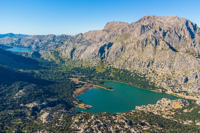 Scenic tour by Train, Tram and Boat through the lakes - Leaving Palma for the Tramuntana mountains