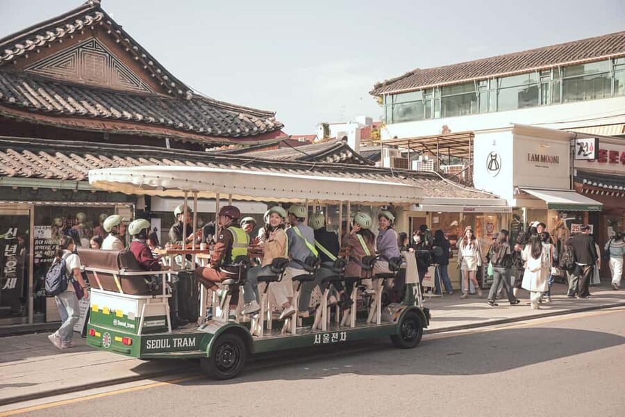Seoul: Guided Tram Tour with Snacks and Hidden Alleys - Passing Changdeokgung Palace