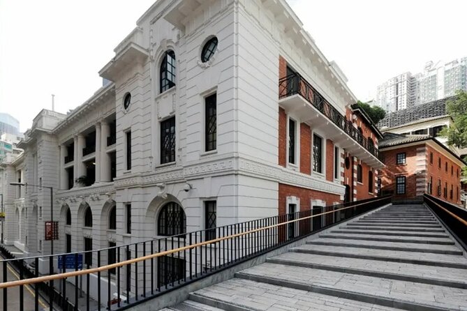 Top-Rated Hong Kong Tour: Peak Tram, Dim Sum & Cultural Sights - Walking through Old Town Central