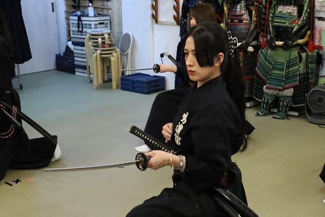 Train Katana with Real Dojo Students in Kyoto - Watching real katana cutting on rolled tatami