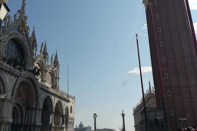 Venice by Train from Rome: Enjoy a Private Day Tour Experience - Rialto Bridge and the market area
