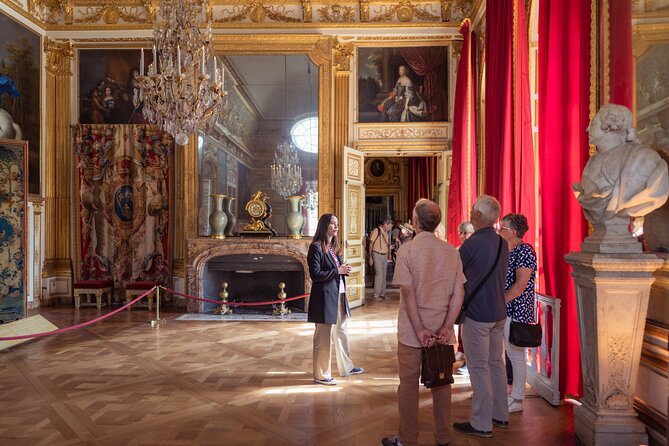 Versailles Palace and Gardens Tour by Train from Paris - Entering the Palace of Versailles with a guide