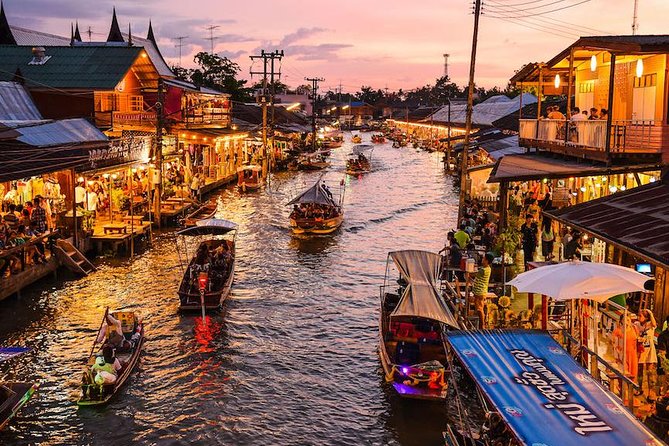 VIP Private Tour Damnoen Saduak+ Amphawa + Mae Klong Railway - Watching Maeklong Market fold around the train