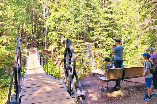 Whistler Train Wreck, Suspension Bridge & Hidden Waterfall Adventure - Crossing the Cheakamus Suspension Bridge