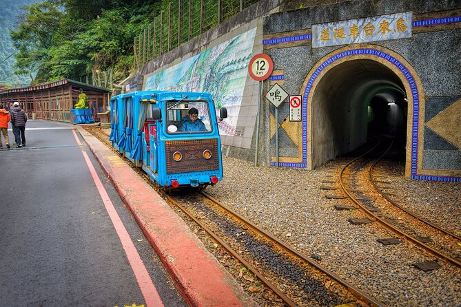 Wulai Nature Tour: Scenic Train, Waterfalls & Indigenous Cuisine - The historic Wulai log cart train